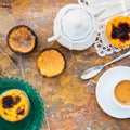 Conceived with the morning coffee and cakes Pasteis de nata, typical pastry from Portugal on natural marble surface. Royalty Free Stock Photo
