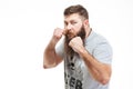 Concentraited man standing in boxer position and ready to fight Royalty Free Stock Photo