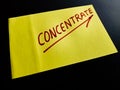 concentrate word displayed on dark background with handwritten concept Royalty Free Stock Photo