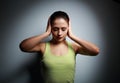 Concentrate young woman thinking and holding head with pain