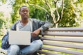 Concentrated man working on his laptop outdoors Royalty Free Stock Photo