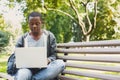 Concentrated man working on his laptop outdoors Royalty Free Stock Photo