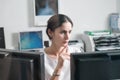 concentrated asian woman radiologist woking in office in radiology department in clinic. female doctor looking at Royalty Free Stock Photo