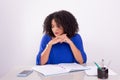 Concentrated beautiful young woman reading work material