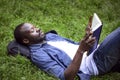 Concentrated Black Male Student Reading