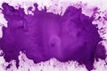 concentrated blot of dark purple watercolor against a light backdrop