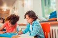 Concentrated boy solving math problems at class Royalty Free Stock Photo