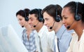 Concentrated business people using headset Royalty Free Stock Photo