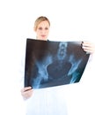 Concentrated female doctor looking at a x-ray Royalty Free Stock Photo