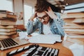 Concentrated Freelance Writer Working at Desk. Royalty Free Stock Photo