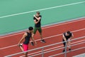 Concentrated multiethnic athlete group make stretching exercises Royalty Free Stock Photo