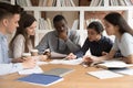 Focused diverse multiracial students work on group project Royalty Free Stock Photo