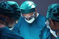 Concentrated professional surgical doctor team operating surgery a patient in the operating room at the hospital Royalty Free Stock Photo