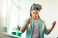 Concentrated schoolgirl exploring the world of virtual reality.