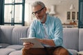 Concentrated senior man in casual clothing