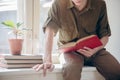 Concentrated serious young man read book Royalty Free Stock Photo