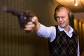 Shooter practicing sport handgun shooting at firing range