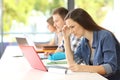 Concentrated student e-learning in a classroom Royalty Free Stock Photo
