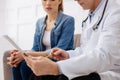 Concentrated trained doctor prescribing needed treatment