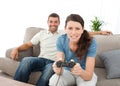 Concentrated woman playing video games