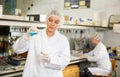 Shot of an young woman using equipment to work in a laboratory Royalty Free Stock Photo