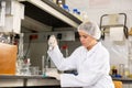 Shot of an young woman using equipment to work in a laboratory Royalty Free Stock Photo