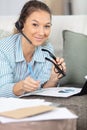 concentrated woman wearing headset with microphone Royalty Free Stock Photo