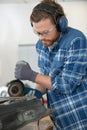 concentrated workers using grinder Royalty Free Stock Photo