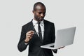 Concentrated young African man in formalwear Royalty Free Stock Photo