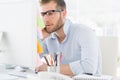 Concentrated young man using computer Royalty Free Stock Photo