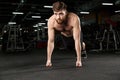 Concentrated young strong sports man make sport exercise Royalty Free Stock Photo