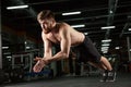 Concentrated young strong sports man make sport exercise Royalty Free Stock Photo