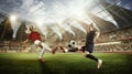 Concentrated young women, soccer, football players in motion, during match, playing o 3D football arena under open air Royalty Free Stock Photo