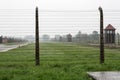 Concentration camp Birkenau with green grass in the rain, Oswiencim Poland