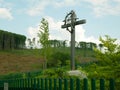 HODONIN KUNSTATU, CZECH REPUBLIC, APRIL 10, 2023: Concentration camp cross memorial people tourist crucifix labour Gypsy