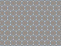 Concentric brown and tan circles create a retro pattern on blue. Royalty Free Stock Photo