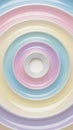 Concentric Circles of Pastel Colored Swirls with Metallic Silver Edges Creating a Smooth Abstract Background Pattern Royalty Free Stock Photo