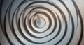 Concentric circular patterns create a ripple-like effect, forming a 3D optical illusion. Royalty Free Stock Photo