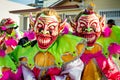 Closeup two men in scary clowns costumes pose for photo at dominican carnival Royalty Free Stock Photo