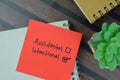 Concept of Accidental or Intentional write on a sticky notes isolated on Wooden Table Royalty Free Stock Photo