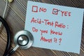 Concept of Acid-test ratio, Do you know it? Yes write on sticky notes isolated on Wooden Table Royalty Free Stock Photo