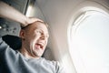 Concept aerophobia. Afraid of fear flying on an airplane and at height Royalty Free Stock Photo