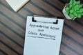 Concept of Affirmative Action and College Admissions write on paperwork isolated on Wooden Table Royalty Free Stock Photo