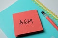 Concept of AGM write on sticky notes isolated on white background Royalty Free Stock Photo