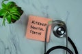 Concept of Altered Mental Status write on sticky notes with stethoscope isolated on Wooden Table