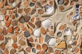 Concept of ancient culture Close up photo of broken colored stones and seashell with mosaic background .Pattern of