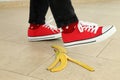 Concept of April Fool`s Day prank with banana peel