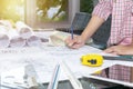 Concept architects.engineer holding pen pointing. Royalty Free Stock Photo