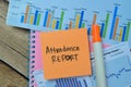 Concept of Attendance Report write on sticky notes isolated on Wooden Table Royalty Free Stock Photo