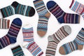 Multicolored knitted socks with ornaments, cute gift.